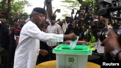 FILE - Vice President Yemi Osinbajo casts his vote at the Victoria Garden City in Lagos, Nigeria, Feb. 23, 2019. 