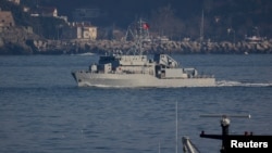 The Turkish Navy's Aydin class mine hunting vessel TCG Akcay sails in the Bosphorus on its way to the Black Sea, near Istanbul, Turkey, March 26, 2022.