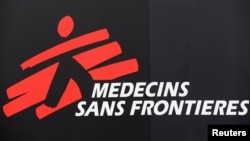 FILE - The logo of Medecins Sans Frontieres (MSF - Doctors Without Borders) is seen at the international medical humanitarian organization MSF logistics center in Merignac, near Bordeaux, France, Dec. 6, 2018.