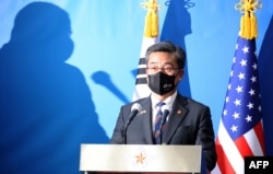 FILE- South Korean Defense Minister Suh Wook speaks during a news conference at the Defense Ministry in Seoul, Dec. 2, 2021.