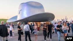 A giant cowboy hat is on display outside the Tesla Giga Texas manufacturing facility during the "Cyber Rodeo" grand opening party on April 7, 2022 in Austin, Texas.