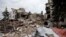 FILE - A view of the Mariupol theater damaged during fighting in Mariupol, in territory under the government of the Donetsk People's Republic, eastern Ukraine, April 4, 2022.