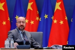 FILE - European Council President Charles Michel attends a virtual EU-China summit, at the European Council building in Brussels, Belgium, April 1, 2022.