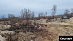 Scorched earth is seen near trenches that Ukraine says Russian troops dug in radioactive soil near the Chernobyl nuclear power plant, damaged in a 1986 disaster, before withdrawing on March 31, 2022. Photo taken April 5, 2022. (Courtesy Evgen Kramarenko)