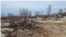 Scorched earth is seen near trenches that Ukraine says Russian troops dug in radioactive soil near the Chernobyl nuclear power plant, damaged in a 1986 disaster, before withdrawing on March 31, 2022. Photo taken April 5, 2022. (Courtesy Evgen Kramarenko)