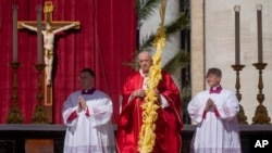 Pope Francis celebrates Palm Sunday Mass in St. Peter's Square at the Vatican, April 10, 2022.