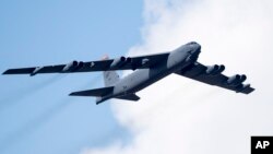 FILE - A U.S. Air Force B-52 strategic bomber flies over Pabrade during a military exercise some 60 km (38 miles) north of the capital Vilnius, Lithuania, June 16, 2016. Russia's Defense Ministry said on Tuesday one of its fighter jets intercepted a B-52 bomber over the Baltic Sea.