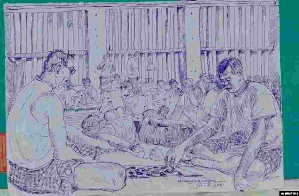MYANMAR-POLITICS/PRISON -A smuggled sketch shows people inside of Myanmar&#39;s Insein prison with a written date April 17, 2021, in this undated picture obtained by REUTERS