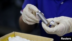 In this file photo, batteries for electric vehicles are shown being manufactured at a factory in Dongguan, China September 20, 2017. (REUTERS/Bobby Yip)