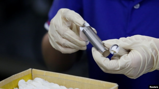 In this file photo, batteries for electric vehicles are shown being manufactured at a factory in Dongguan, China September 20, 2017. (REUTERS/Bobby Yip)