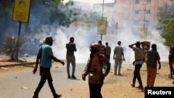 FILE: Protesters march during a rally in Khartoum, Sudan, May 19, 2022