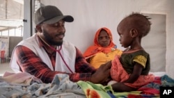 FILE - A Sudanese child suffering from malnutrition is treated at a Doctors Without Borders clinic in Metche Camp, Chad, near the Sudanese border, on April 6, 2024. The United Nations reported on Aug. 1, 2024, that several parts of Sudan are in or approaching famine conditions.