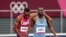 Isaiah Jewett, left, of the United States, and Nijel Amos, of Botswana, prop each other up after falling in the men's 800-meter semifinal at the 2020 Summer Olympics in Tokyo, Aug. 1, 2021.