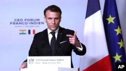 French President Emmanuel Macron addresses a forum on the sidelines of the Artificial Intelligence Action Summit in Paris, Feb. 11, 2025.