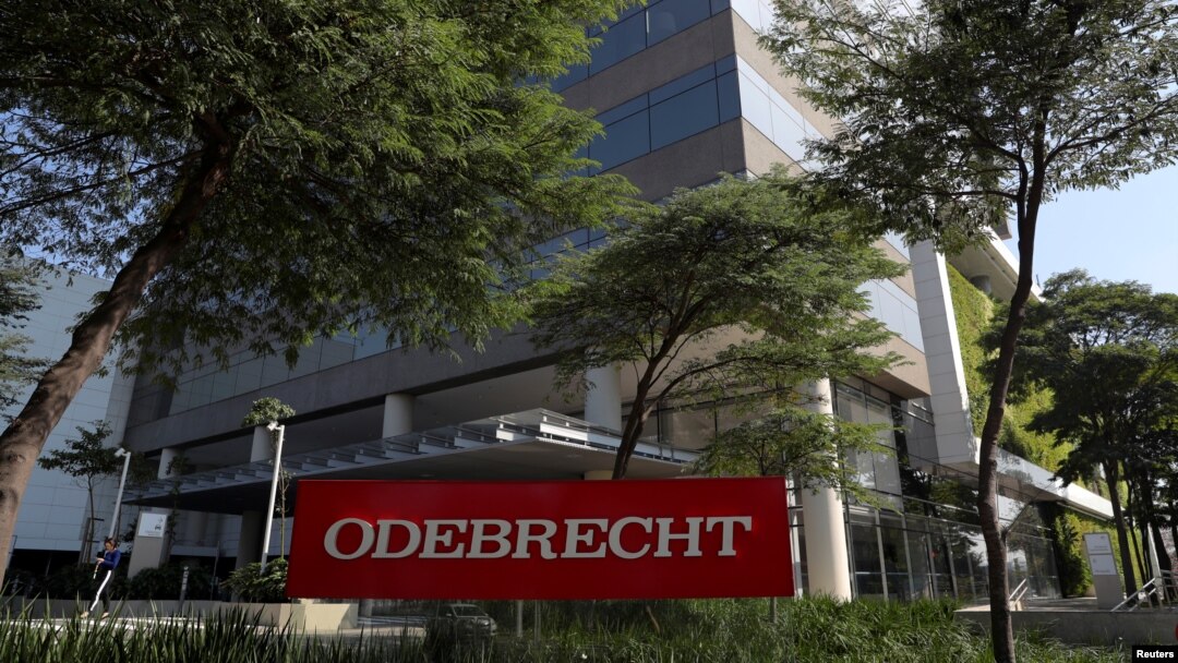 FILE - The corporate logo of the Odebrecht SA construction conglomerate is seen at its headquarters in Sao Paulo, Brazil, July 29, 2019.