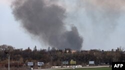 Smoke raises from the airport of Dnipro, on Apr. 10, 2022, amid Russian invasion of Ukraine.