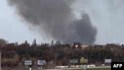 Smoke raises from the airport of Dnipro, on Apr. 10, 2022, amid Russian invasion of Ukraine.