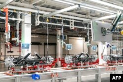 FILE - View of the inside of the Tesla Giga Texas manufacturing facility during a tour ahead of the 'Cyber Rodeo' grand opening party on April 7, 2022 in Austin, Texas.