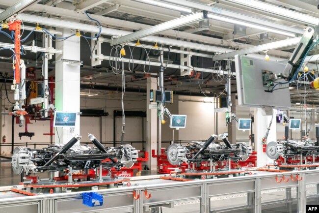 FILE - View of the inside of the Tesla Giga Texas manufacturing facility during a tour ahead of the 'Cyber Rodeo' grand opening party on April 7, 2022 in Austin, Texas.