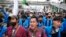 Students shout slogans during a rally outside the parliament in Jakarta, Indonesia, Monday, April 11, 2022. 