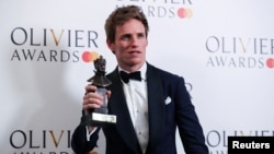 Eddie Redmayne poses after winning the Best Actor in a Musical award for the "Cabaret" at the Olivier Awards at the Royal Opera House in London, Britain, April 10, 2022.