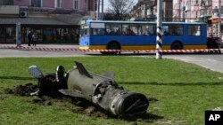A part of a Tochka-U missile lies on the ground following an attack at the railway station in Kramatorsk, Ukraine, April 8, 2022. (AP Photo/Andriy Andriyenko)