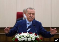 FILE - Turkey's President Recep Tayyip Erdogan speaks in Nicosia, Cyprus, July 19, 2021.