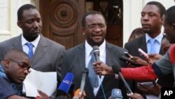 MDC spokesperson Douglas Mwonzora, centre, addresses the media outside the Constitutional Court in Harare.