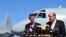 Australia's Minister of Defence David Johnston and Angus Houston (L), a retired air chief marshal and head of the Australian agency coordinating the search for Malaysia Airlines Flight MH370, address the media at the RAAF Base Pearce near Perth, April 8, 