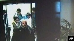 A hotel security camera shows men in tennis outfits following Hamas commander Mahmoud al-Mabhouh into his hotel room