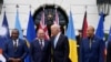 President Joe Biden talks with Cook Islands Prime Minister Mark Brown, second from left, with Pacific Islands Forum leaders in Washington, Sept. 25, 2023. Papua New Guinean Prime Minister James Marape, left, and Kiribati's President Taneti Maamau, right, look on. 