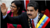 FILE - Venezuelan President Nicolas Maduro greets the National Constituent Assembly and its leader, Delcy Rodriguez, in Caracas, Jan. 15. Maduro says he will seek re-election. 