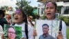 FILE - Cambodia's exiled opposition leader Sam Rainsy talks to the media outside Parliament House in Kuala Lumpur, Malaysia, Nov. 12, 2019. 