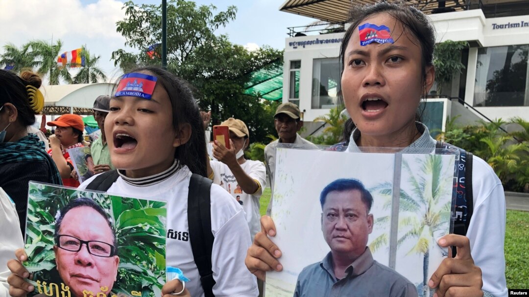 FILE - Cambodia's exiled opposition leader Sam Rainsy talks to the media outside Parliament House in Kuala Lumpur, Malaysia, Nov. 12, 2019. 