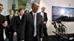 Speaker of the House John Boehner talks to reporters in Washington, Monday, Dec. 31, 2012. 