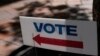 FILE - A sign stands outside an early voting location in Miami, Florida, Oct. 31, 2022. U.S. midterm elections have been closely followed overseas — especially in Europe, where analysts say some of America’s closest and oldest allies are relieved U.S. democracy held the course. 