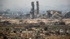 Destroyed buildings are pictured near Nuseirat in the central Gaza Strip on Feb. 10, 2025 amid the current ceasefire deal in the war between Israel and Hamas.