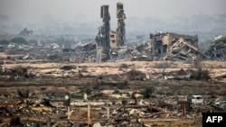 Destroyed buildings are pictured near Nuseirat in the central Gaza Strip on Feb. 10, 2025 amid the current ceasefire deal in the war between Israel and Hamas.