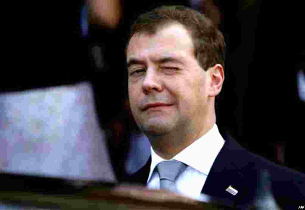 Russia's President Dmitry Medvedev winks at the journalist as he leave the presidential palace after meeting with Cypriot President Dimitris Christofias in divided capital Nicosia, Cyprus, Thursday, Oct. 7, 2010. Medvendev is in Cyprus for two-day offici