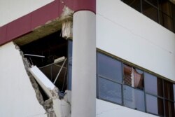 A municipal building is damaged after a magnitude 5.9 earthquake in Guanica, Puerto Rico, Jan. 11, 2020.