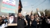 Demonstrators in Tehran protest the assassination of the Iranian Major-General Qassem Soleimani, head of the elite Quds Force, and Iraqi militia commander Abu Mahdi al-Muhandis, who were killed in a US air strike in Baghdad airport, Jan. 3, 2020.