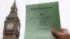 FILE - The passage of the Brexit Article 50 bill, shown in front of the Houses of Parliament in London, Jan. 26, 2017, starts Britain's process of leaving the European Union.