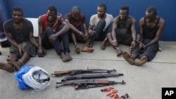 Arrested pirates that hijacked the Panama-flagged Maximus vessel are shown to the media in Lagos, Nigeria, Feb. 22, 2016. Acts of piracy have increased in the Gulf of Guinea area although piracy has been declining worldwide.