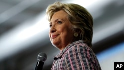 Democratic presidential candidate Hillary Clinton surveys the crowd during a campaign stop in Coral Springs, Florida, Sept. 30, 2016.