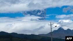 Ashes rise above the Cotopaxi volcano in the Andes mountains about 50km south of Quito, Ecuador, Aug. 14, 2015.