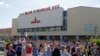 People attend an opposition demonstration to protest against presidential election results near the Minsk Automobile Plant (MAZ) in Minsk, Belarus, Aug. 17, 2020. 