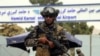 FILE — Taliban special force fighters guard Hamid Karzai International Airport after the U.S. military's withdrawal, in Kabul, Afghanistan, Aug. 31, 2021. Pakistan's leader said militant groups are using military equipment the U.S. left behind to attack Pakistani security forces.