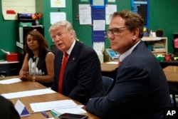Republican presidential candidate Donald Trump meets with students and educators before speaking about school choice at the Cleveland Arts and Social Sciences Academy in Cleveland, Sept. 8, 2016.