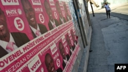 Election posters of presidential candidate Jovenel Moise of PHTK political Party are seen on a wall in Port-au-Prince, on Dec. 22, 2015. 