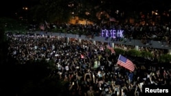 Anti-government demonstrators march in protest against the invocation of the emergency laws in Hong Kong, China, October 14, 2019. REUTERS/Umit Bektas